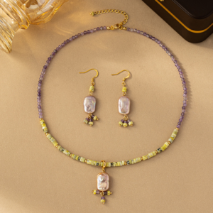 "Regal Elegance: Amethyst Crystal Necklace with Baroque Pearl Pendant"