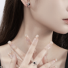 "Irregular Charm: Asymmetrical Star-Shaped Lock Necklace with Minimalist Pendant" - Image 2